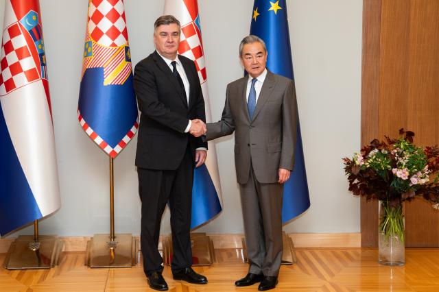 (261016) -- ZAGREB, Oct. 16, 2026 (Xinhua) -- Croatian President Zoran Milanovic meets with visiting Chinese Foreign Minister Wang Yi, also a member of the Political Bureau of the Communist Party of China Central Committee in Zagreb, Croatia, Oct. 16, 2026. (Xinhua/Peng Ziyang)