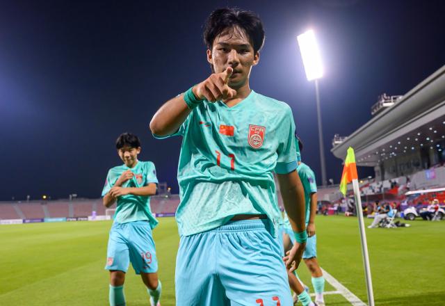 (261017) -- DOHA, Oct. 17, 2026 (Xinhua) -- Liu Yuyang of China celebrates after scoring during the Gulf Football Federation (GFF) Gulf Cup U-17 Qatar 2026 football match between Qatar and China at Grand Hamad Stadium in Doha, Qatar, Oct. 16, 2026. (Photo by Nikku/Xinhua)