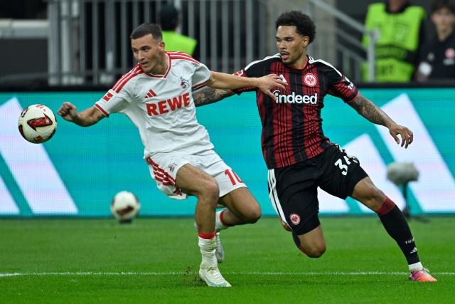 (261017) -- FRANKFURT, Oct. 17, 2026 (Xinhua) -- Nnamdi Collins (R) of Eintracht Frankfurt vies with Said El Mala of FC Cologne during the German first division Bundesliga football match between Eintracht Frankfurt and FC Cologne in Frankfurt, Germany, Oct. 16, 2026. (Photo by Ulrich Hufnagel/Xinhua)