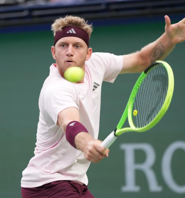 (261017) -- SHANGHAI, Oct. 17, 2026 (Xinhua) -- Alejandro Davidovich Fokina hits a return during the men's singles semifinal between Alexander Zverev of Germany and Alejandro Davidovich Fokina of Spain at the 2026 ATP tour Shanghai Masters tennis tournament in Shanghai, China, Oct. 17, 2026. (Xinhua/Ding Ting)