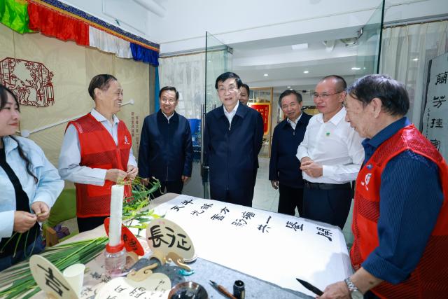 (261017) -- CHENGDU, Oct. 17, 2026 (Xinhua) -- Wang Huning, a member of the Standing Committee of the Political Bureau of the Communist Party of China Central Committee and chairman of the National Committee of the Chinese People's Political Consultative Conference, inspects Jifu community in Wuhou District of Chengdu City, southwest China's Sichuan Province, Oct. 15, 2026. Wang made an inspection tour in Chengdu, Deyang and the Garze Tibetan Autonomous Prefecture in southwest China's Sichuan Province from Oct. 13 to 16. (Xinhua/Liu Bin)