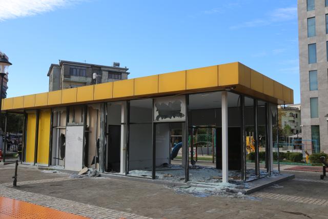 (261017) -- TIRANA, Oct. 17, 2026 (Xinhua) -- A public facility damaged during protests is pictured in Tirana, Albania, Oct. 16, 2026. Protests in Albania continued on Saturday, which have escalated into violent clashes with police and left government buildings, banks, businesses and public facilities damaged in the capital Tirana. (Xinhua/Chen Gang)