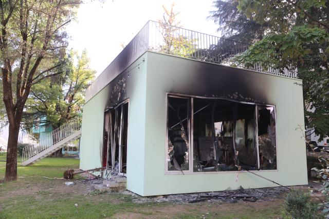 (261017) -- TIRANA, Oct. 17, 2026 (Xinhua) -- A public facility damaged during protests is pictured in Tirana, Albania, Oct. 16, 2026. Protests in Albania continued on Saturday, which have escalated into violent clashes with police and left government buildings, banks, businesses and public facilities damaged in the capital Tirana. (Xinhua/Chen Gang)