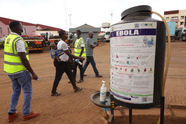 (261017) -- NAIROBI, Oct. 17, 2026 (Xinhua) -- Travelers enter Kenya through the One-Stop Border Post in Busia, Kenya, Oct. 16, 2026. Kenya's Ministry of Health on Saturday confirmed four new cases of Ebola Bundibugyo virus disease, bringing the total number of cases to seven, as efforts to prevent community transmission of the disease gathered pace. Kenya has stepped up Ebola screening and control measures at its border crossings. (Photo by John Okoyo/Xinhua)