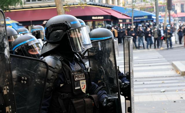 (261017) -- PARIS, Oct. 17, 2026 (Xinhua) -- Law enforcement officers are seen during a protest in Paris, France, Oct. 17, 2026. French Interior Minister Laurent Nunez said Saturday that about 550,000 people took part in the protests across France. According to French media reports, the demonstrations brought together farmers, climate activists, trade unions and students, expressing demands on fuel prices, the cost of living, education and public services. (Xinhua/Wu Huiwo)
