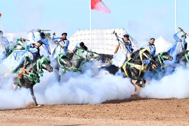 (261018) -- BEIJING, Oct. 18, 2026 (Xinhua) -- This photo taken on Oct. 16, 2026 shows a scene during Tbourida, a Moroccan equestrian performance, at the 17th Horse Show of El Jadida, in El Jadida, Morocco. Tbourida is a Moroccan equestrian performance dating back to the 16th century. It was inscribed on UNESCO's Representative List of the Intangible Cultural Heritage of Humanity in 2021. (Photo by Aissa/Xinhua)