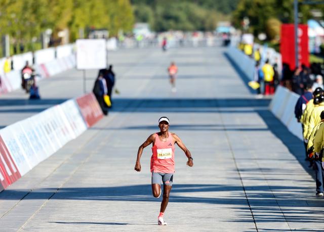 (261018) -- BEIJING, Oct. 18, 2026 (Xinhua) -- Muktar Edris of Ethiopia sprints to the finish line to win the second place of the men's marathon event during the 2026 Beijing Marathon & National Marathon Championships in Beijing, capital of China, Oct. 18, 2026. (Xinhua/Luo Yuan)