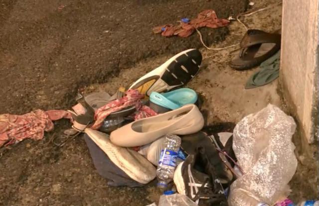(261018) -- KOLKATA, Oct. 18, 2026 (Xinhua) -- Footwear lies scattered at a stampede site at the Chorbagan Sarbojanin neighborhood in Kolkata, West Bengal, India, Oct. 17, 2026. The death toll in Saturday's stampede in India's eastern city of Kolkata rose to 19, with 25 injured people receiving treatment in different hospitals and one in a critical condition, confirmed West Bengal Chief Minister Suvendu Adhikari on Sunday. (IANS via Xinhua)
