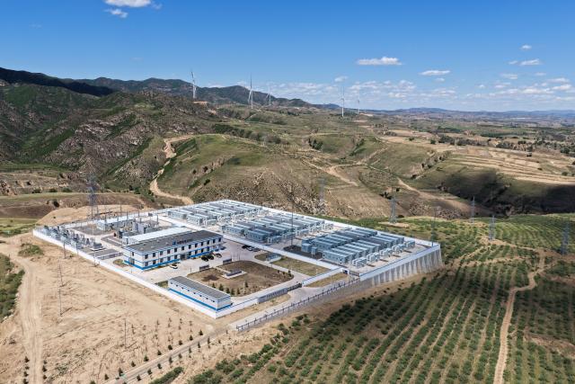 (261018) -- HOHHOT, Oct. 18, 2026 (Xinhua) -- An aerial drone photo taken on June 4, 2026 shows a wind-photovoltaic power storage station of Huadian (Inner Mongolia) New Energy Co., Ltd. as part of the Horinger data center cluster green energy supply demonstration project, in Hohhot, north China's Inner Mongolia Autonomous Region. (Xinhua/Li Zhipeng)