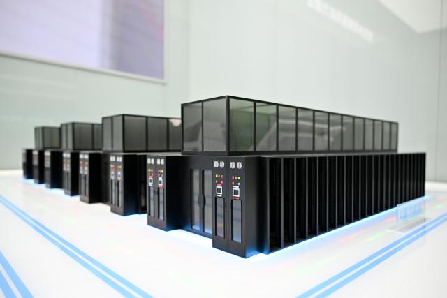 (261018) -- HOHHOT, Oct. 18, 2026 (Xinhua) -- This photo taken on Sept. 10, 2026 shows models of computing facilities displayed at the zero-carbon computing base of Centrin Data at the Ulanqab Chahar High Tech Development Zone, in Ulanqab, north China's Inner Mongolia Autonomous Region. (Xinhua/Li Zhipeng)