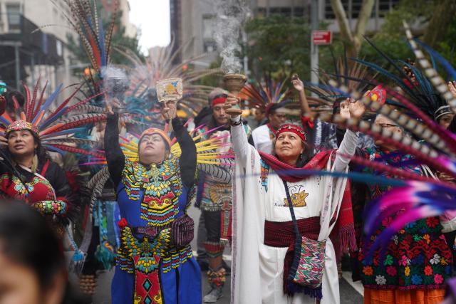 (261018) -- NEW YORK, Oct. 18, 2026 (Xinhua) -- People participate in a ceremony of indigenous people in New York, the United States, Oct. 17, 2026. The 5th Annual National Indigenous Peoples of the Americas Parade was held here on Saturday. (Xinhua/Zhang Fengguo)