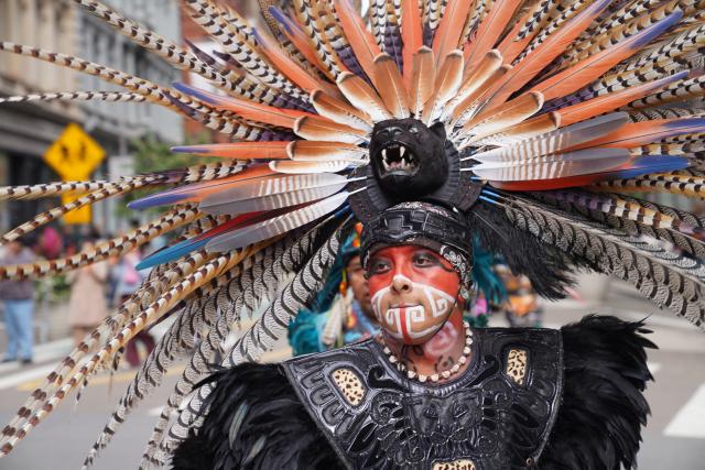 (261018) -- NEW YORK, Oct. 18, 2026 (Xinhua) -- People participate in a parade of indigenous people in New York, the United States, Oct. 17, 2026. The 5th Annual National Indigenous Peoples of the Americas Parade was held here on Saturday. (Xinhua/Zhang Fengguo)