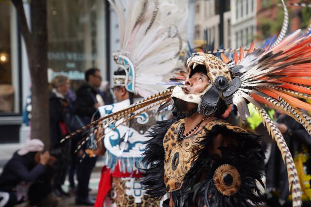 (261018) -- NEW YORK, Oct. 18, 2026 (Xinhua) -- People participate in a ceremony of indigenous people in New York, the United States, Oct. 17, 2026. The 5th Annual National Indigenous Peoples of the Americas Parade was held here on Saturday. (Xinhua/Zhang Fengguo)