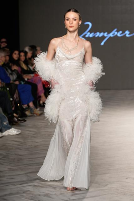 (261018) -- VANCOUVER, Oct. 18, 2026 (Xinhua) -- A model presents a creation by Chinese fashion designer Jumper Zhang during Vancouver Fashion Week 2026 in Vancouver, British Columbia, Canada, on Oct. 17, 2026. (Photo by Liang Sen/Xinhua)