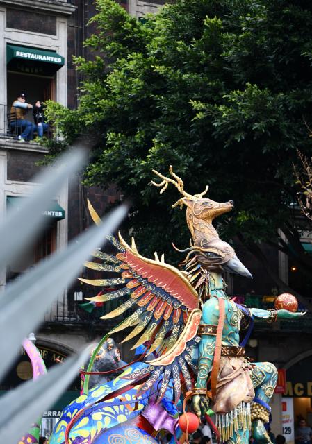 (261018) -- MEXICO CITY, Oct. 18, 2026 (Xinhua) -- This photo taken on Oct. 17, 2026 shows a scene of the Monumental Alebrijes Parade 2026 in Mexico City, Mexico. Alebrijes are brightly colored folk art sculptures of fantastical creatures. (Xinhua/Zhao Hui)