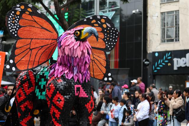 (261018) -- MEXICO CITY, Oct. 18, 2026 (Xinhua) -- This photo taken on Oct. 17, 2026 shows a scene of the Monumental Alebrijes Parade 2026 in Mexico City, Mexico. Alebrijes are brightly colored folk art sculptures of fantastical creatures. (Photo by Francisco Canedo/Xinhua)