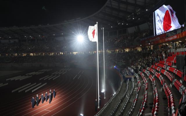 (261018) -- NAGOYA, Oct. 18, 2026 (Xinhua) -- The Japanese national flag is raised during the opening ceremony of the Aichi-Nagoya Asian Para Games in Nagoya, Japan, Oct. 18, 2026. (Xinhua/Yao Qilin)