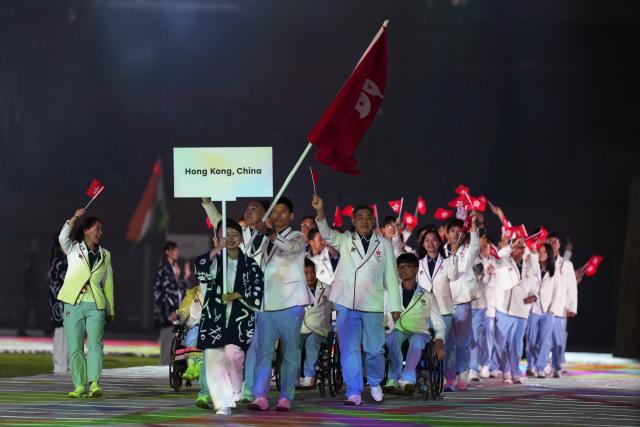 (261018) -- NAGOYA, Oct. 18, 2026 (Xinhua) -- The delegation of China's Hong Kong parades into the stadium during the opening ceremony of the Aichi-Nagoya Asian Para Games in Nagoya, Japan, Oct. 18, 2026. (Xinhua/Yao Qilin)