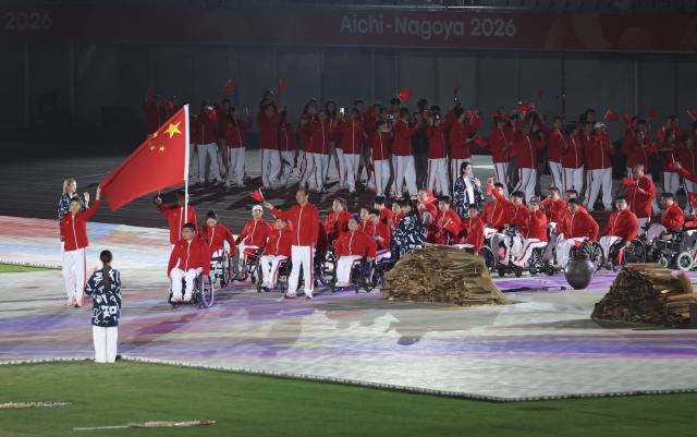 (261018) -- NAGOYA, Oct. 18, 2026 (Xinhua) -- The delegation of China parades into the stadium during the opening ceremony of the Aichi-Nagoya Asian Para Games in Nagoya, Japan, Oct. 18, 2026. (Xinhua/Yao Qilin)