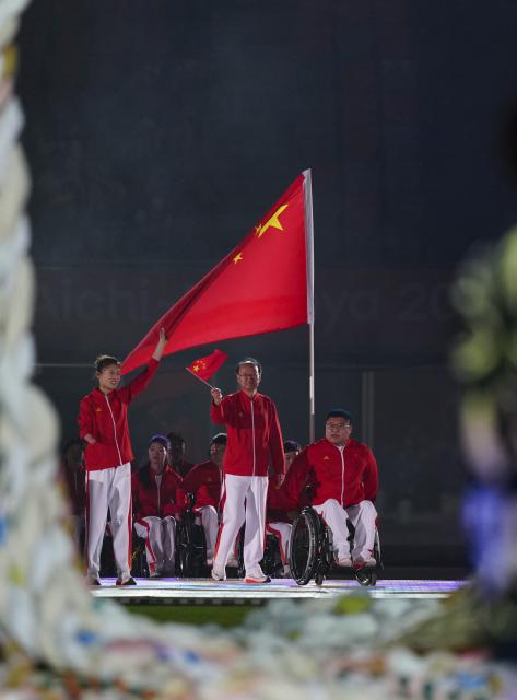 (261018) -- NAGOYA, Oct. 18, 2026 (Xinhua) -- The delegation of China parades into the stadium during the opening ceremony of the Aichi-Nagoya Asian Para Games in Nagoya, Japan, Oct. 18, 2026. (Xinhua/Jia Haocheng)