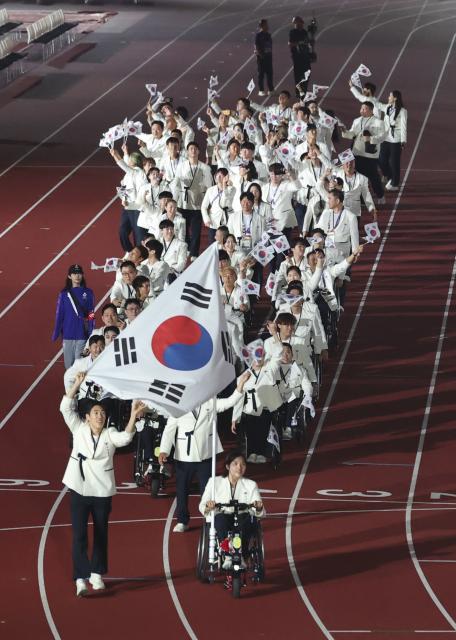 (261018) -- NAGOYA, Oct. 18, 2026 (Xinhua) -- The delegation of South Korea parades into the stadium during the opening ceremony of the Aichi-Nagoya Asian Para Games in Nagoya, Japan, Oct. 18, 2026. (Xinhua/Yao Qilin)