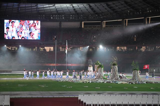 (261018) -- NAGOYA, Oct. 18, 2026 (Xinhua) -- The delegation of China's Hong Kong parades into the stadium during the opening ceremony of the Aichi-Nagoya Asian Para Games in Nagoya, Japan, Oct. 18, 2026. (Xinhua/Then Chih Wey)