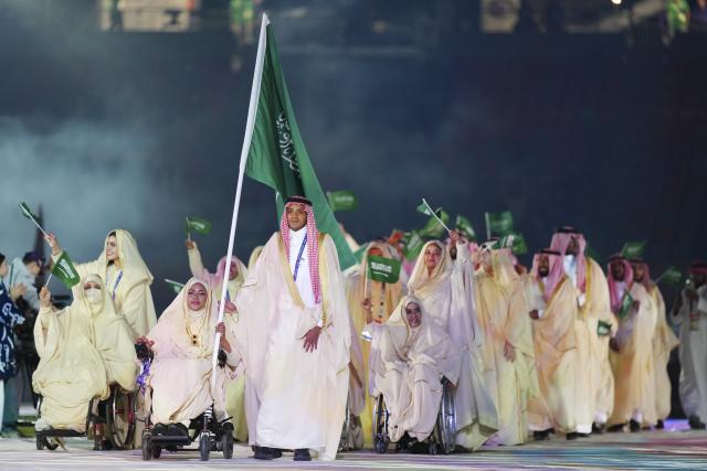 (261018) -- NAGOYA, Oct. 18, 2026 (Xinhua) -- The delegation of Saudi Arabia parades into the stadium during the opening ceremony of the Aichi-Nagoya Asian Para Games in Nagoya, Japan, Oct. 18, 2026. (Xinhua/Jia Haocheng)