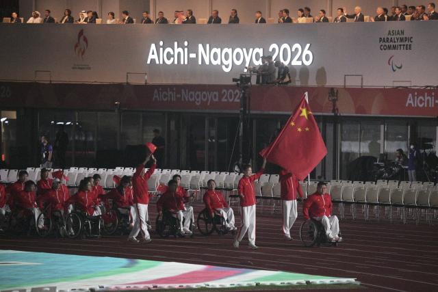 (261018) -- NAGOYA, Oct. 18, 2026 (Xinhua) -- The delegation of China parades into the stadium during the opening ceremony of the Aichi-Nagoya Asian Para Games in Nagoya, Japan, Oct. 18, 2026. (Xinhua/Then Chih Wey)