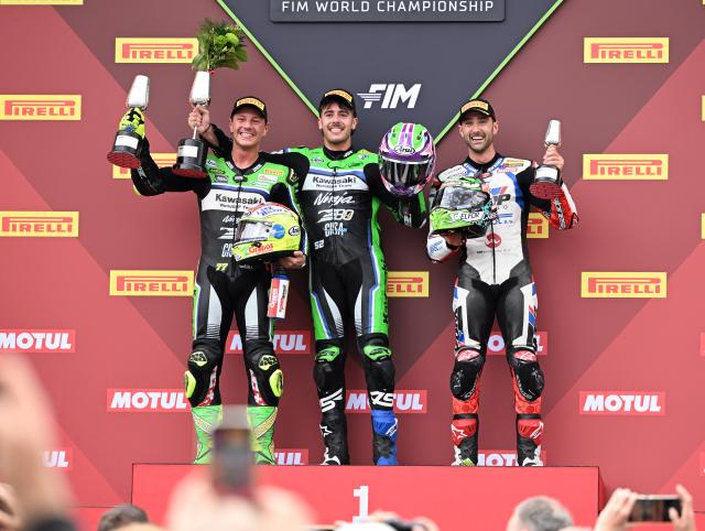 (261018) -- JEREZ, Oct. 18, 2026 (Xinhua) -- Jeremy Alcoba (C) of Kawasaki WorldSSP Team, Dominique Aegerter (L) of Kawasaki WorldSSP Team and Matteo Ferrari of WRP Racing pose on the podium after the Race 2 of WorldSSP at the FIM Supersport World Championship Spanish Round in Jerez, Spain, Oct. 18, 2026. (Xinhua/Cheng Min)