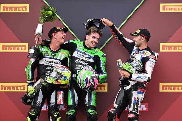 (261018) -- JEREZ, Oct. 18, 2026 (Xinhua) -- Jeremy Alcoba (C) of Kawasaki WorldSSP Team, Dominique Aegerter (L) of Kawasaki WorldSSP Team and Matteo Ferrari of WRP Racing celebrate on the podium after the Race 2 of WorldSSP at the FIM Supersport World Championship Spanish Round in Jerez, Spain, Oct. 18, 2026. (Xinhua/Cheng Min)