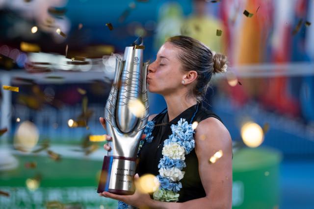 (261018) -- WUHAN, Oct. 18, 2026 (Xinhua) -- Maja Chwalinska kisses the trophy during the awarding ceremony after the women's singles final match between Maja Chwalinska of Poland and Sonay Kartal of Britain at the 2026 Wuhan Open tennis tournament in Wuhan, capital of central China's Hubei Province, Oct. 18, 2026. (Xinhua/Wu Zhizun)