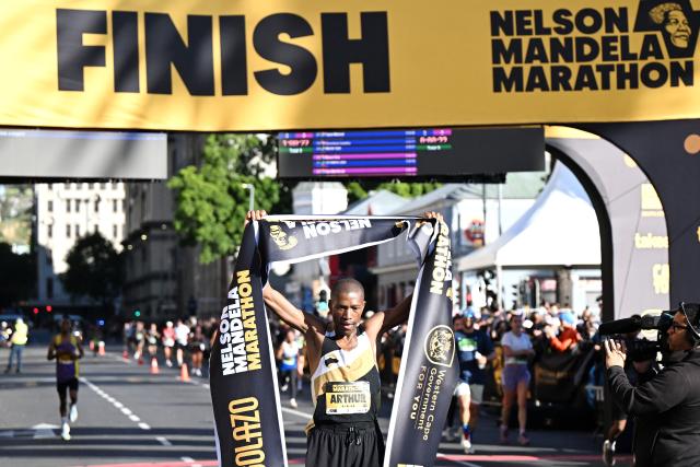 (261018) -- CAPE TOWN, Oct. 18, 2026 (Xinhua) -- South Africa's Arthur Jantjies celebrates after winning the men's race at the inaugural Nelson Mandela Marathon in Cape Town, South Africa, Oct. 18, 2026. (Photo by Xabiso Mkhabela/Xinhua)