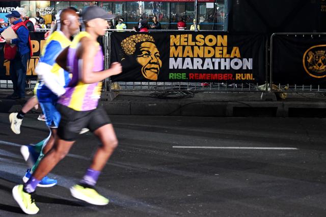 (261018) -- CAPE TOWN, Oct. 18, 2026 (Xinhua) -- Participants run during the inaugural Nelson Mandela Marathon in Cape Town, South Africa, Oct. 18, 2026. (Photo by Xabiso Mkhabela/Xinhua)