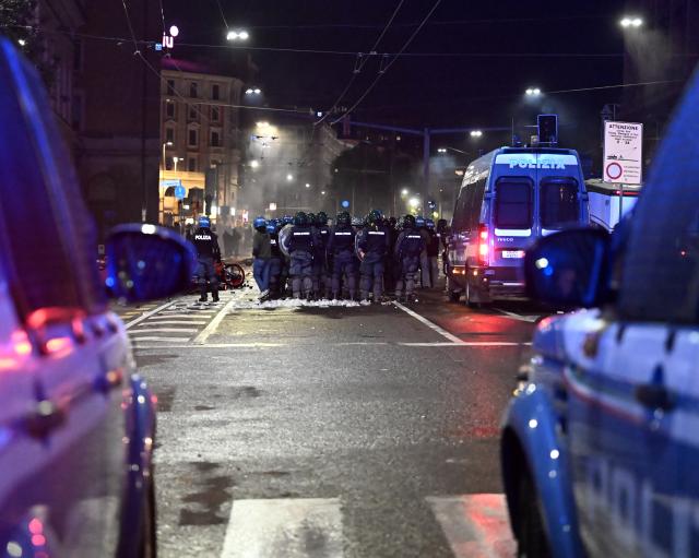 (261018) -- BOLOGNA, Oct. 18, 2026 (Xinhua) -- Photo taken on Oct. 17, 2026 shows violent clashes during protests near the central station of Bologna, Italy. Protests against the rising cost of living turned violent on Saturday in several northern Italian cities, including Milan, Bologna and Turin, leaving dozens of people injured, according to Italian media reports. (Xinhua)