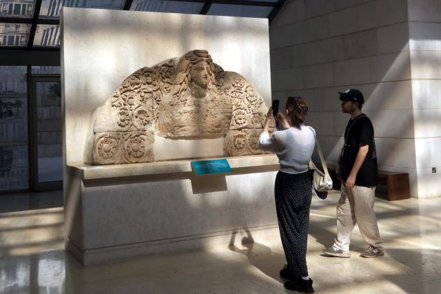 (261018) -- AMMAN, Oct. 18, 2026 (Xinhua) -- Tourists visit the Jordan Museum in Amman, Jordan, Oct. 18, 2026. The Jordan Museum, built in 2014, is the largest museum in Jordan and hosts some of the country's most important archaeological findings. (Photo by Mohammad Abu Ghosh/Xinhua)