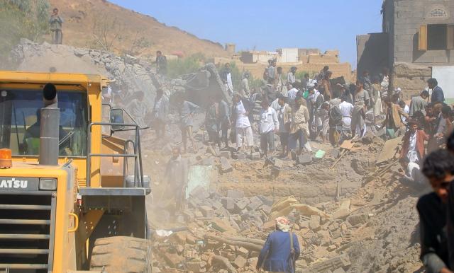 (261018) -- SAADA, Oct. 18, 2026 (Xinhua) -- People search for survivors among the rubble of a house hit by a Saudi airstrike in Saada province, Yemen, on Oct. 18, 2026. Houthi-run al-Masirah TV reported that 10 people were killed and 23 others injured in an alleged Saudi airstrike Sunday on a house in Yemen's northern province of Saada. (Houthi Media Center/Handout via Xinhua)