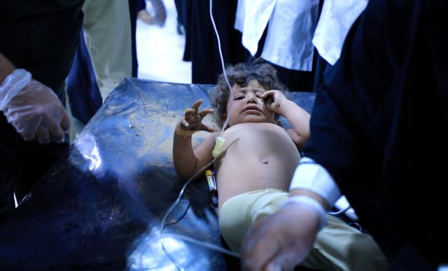 (261018) -- SAADA, Oct. 18, 2026 (Xinhua) -- An injured child is transferred to a hospital after a Saudi airstrike in Saada province, Yemen, on Oct. 18, 2026. Houthi-run al-Masirah TV reported that 10 people were killed and 23 others injured in an alleged Saudi airstrike Sunday on a house in Yemen's northern province of Saada. (Houthi Media Center/Handout via Xinhua)