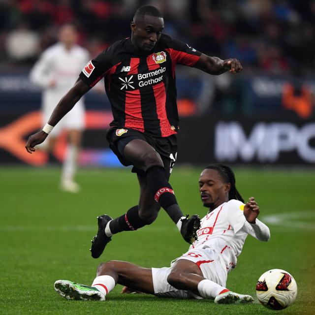 (261019) -- LEVERKUSEN, Oct. 19, 2026 (Xinhua) -- Moussa Diaby (top) of Bayer 04 Leverkusen vies with Jordy Makengo of SC Freiburg during the German first division of Bundesliga football match between Bayer 04 Leverkusen and SC Freiburg in Leverkusen, Germany, Oct. 18, 2026. (Photo by Ulrich Hufnagel/Xinhua)
