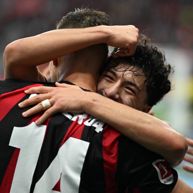 (261019) -- LEVERKUSEN, Oct. 19, 2026 (Xinhua) -- Patrik Schick (L) of Bayer 04 Leverkusen celebrates scoring during the German first division of Bundesliga football match between Bayer 04 Leverkusen and SC Freiburg in Leverkusen, Germany, Oct. 18, 2026. (Photo by Ulrich Hufnagel/Xinhua)