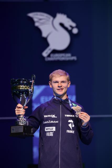 (261019) -- LJUBLJANA, Oct. 19, 2026 (Xinhua) -- Felix Lebrun of France poses with the trophy after winning the men's singles final of the European Table Tennis Championships against Anton Kallberg of Sweden at Stozice Sports Hall in Ljubljana, Slovenia, Oct. 18, 2026. (Photo by Zeljko Stevanic/Xinhua)