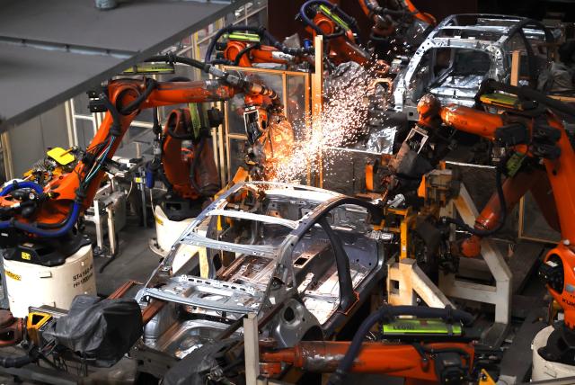 (261019) -- BEIJING, Oct. 19, 2026 (Xinhua) -- Robots operate at a welding workshop of FAW-Volkswagen's east China base in Jimo District of Qingdao, east China's Shandong Province, Oct. 19, 2026. China's gross domestic product (GDP) grew 4.5 percent year on year in the third quarter (Q3) of 2026, data from the National Bureau of Statistics (NBS) showed Monday.
  The country's economy expanded 4.6 percent year on year in the first three quarters.
  The world's second-largest economy generated about 107.11 trillion yuan (about 15.94 trillion U.S. dollars) in output during the January-September period, according to the NBS. (Photo by Liang Xiaopeng/Xinhua)