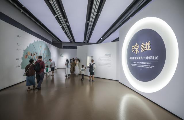 (261019) -- HANGZHOU, Oct. 19, 2026 (Xinhua) -- This photo shows a scene at a special exhibition marking the 90th anniversary of the discovery of the Liangzhu archaeological site in Hangzhou, east China's Zhejiang Province, Oct. 18, 2026. The year 2026 marks the 90th anniversary of the discovery of the Liangzhu ruins. The fourth Liangzhu Forum, which opened Sunday in Hangzhou, has rolled out a series of concurrent cultural events including a sub-forum, a themed special exhibition and a tour in the Archaeological Ruins of Liangzhu City Park. (Xinhua/Xu Yu)
