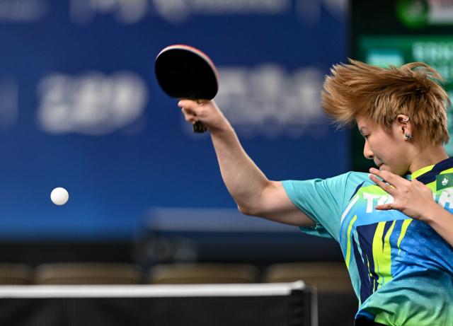 (261019) -- TASHKENT, Oct. 19, 2026 (Xinhua) -- Huang Cheong Leng of China's Macao hits a return to Asel Erkebaeva of Uzbekistan during the women's team group match between China's Macao and Uzbekistan at the 29th ITTF-Asian Table Tennis Championships in Tashkent, Uzbekistan, Oct. 19, 2026. (Xinhua/Feng Kaihua)