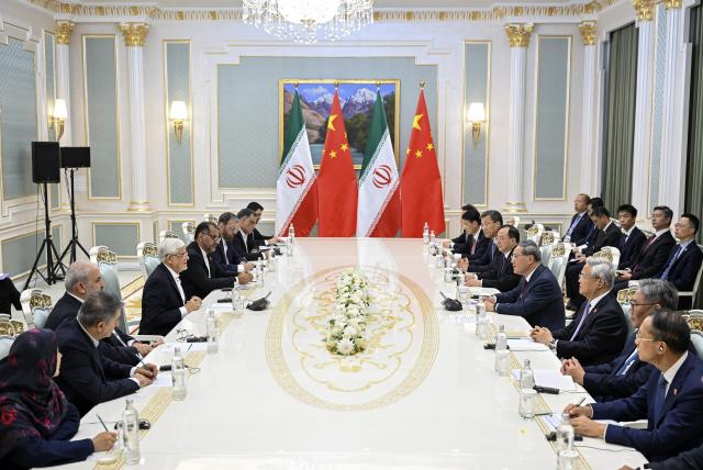 (261019) -- DUSHANBE, Oct. 19, 2026 (Xinhua) -- Chinese Premier Li Qiang meets with Iran's First Vice President Mohammad-Reza Aref on the sidelines of the 25th meeting of the Council of Heads of Government (Prime Ministers) of Member States of the Shanghai Cooperation Organization (SCO) in Dushanbe, Tajikistan, Oct. 19, 2026. (Xinhua/Zhang Ling)
