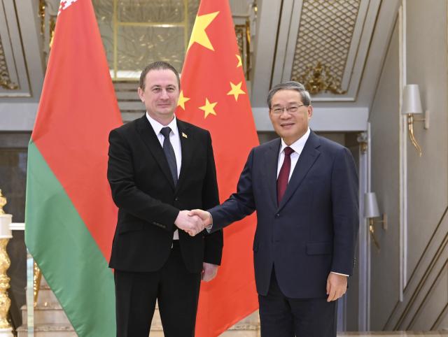 (261019) -- DUSHANBE, Oct. 19, 2026 (Xinhua) -- Chinese Premier Li Qiang meets with Belarusian Prime Minister Alexander Turchin on the sidelines of the 25th meeting of the Council of Heads of Government (Prime Ministers) of Member States of the Shanghai Cooperation Organization (SCO) in Dushanbe, Tajikistan, Oct. 19, 2026. (Xinhua/Zhang Ling)