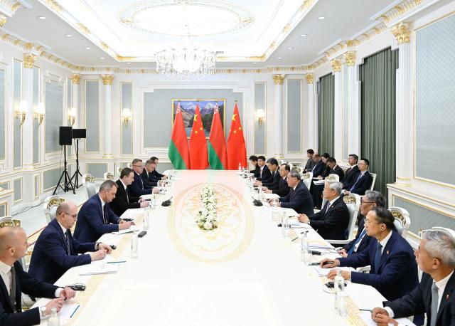 (261019) -- DUSHANBE, Oct. 19, 2026 (Xinhua) -- Chinese Premier Li Qiang meets with Belarusian Prime Minister Alexander Turchin on the sidelines of the 25th meeting of the Council of Heads of Government (Prime Ministers) of Member States of the Shanghai Cooperation Organization (SCO) in Dushanbe, Tajikistan, Oct. 19, 2026. (Xinhua/Shen Hong)