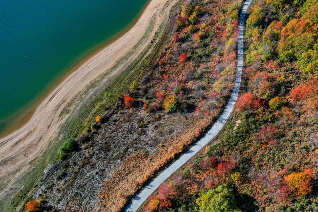 (261019) -- MAVROVO, Oct. 19, 2026 (Xinhua) -- An aerial drone photo shows scenery at Mavrovo National Park in Mavrovo, North Macedonia, Oct. 19, 2026. (Photo by Tomislav Georgiev/Xinhua)