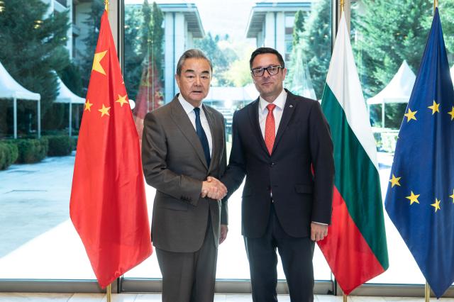 (261019) -- SOFIA, Oct. 19, 2026 (Xinhua) -- Chinese Foreign Minister Wang Yi, also a member of the Political Bureau of the Communist Party of China Central Committee, meets with Bulgarian Deputy Prime Minister Alexander Poulev in Sofia, Bulgaria, Oct. 19, 2026. (Xinhua/Peng Ziyang)