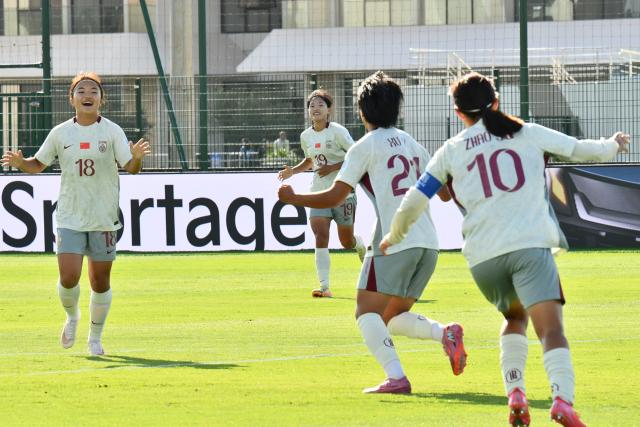 (261020) -- RABAT, Oct. 20, 2026 (Xinhua) -- Players of China celebrate scoring during the first round group E football match between China and Kenya at the FIFA U17 Women's World Cup 2026 in Rabat, Morocco, on Oct. 19, 2026. (Photo by Aissa/Xinhua)