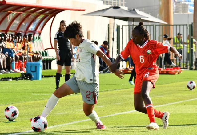 (261020) -- RABAT, Oct. 20, 2026 (Xinhua) -- Xu Yue (L) of China competes with Gaudancia Maloba (R) of Kenya during the first round group E football match between China and Kenya at the FIFA U17 Women's World Cup 2026 in Rabat, Morocco, on Oct. 19, 2026. (Photo by Aissa/Xinhua)